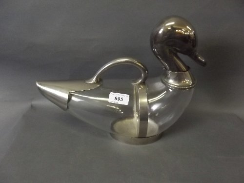 A good large early C20th silver plate and glass claret: A good large early C20th silver plate and glass claret jug in the form of a duck, 13'' wide, 10¼'' high
