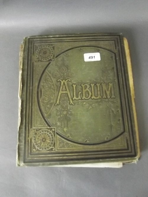 An old photograph album and contents: An old photograph album and contents