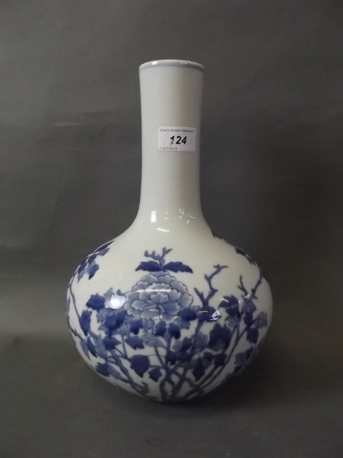 A large Chinese blue and white pottery vase painted: A large Chinese blue and white pottery vase painted with flowers, 6 character mark to base, 12'' high