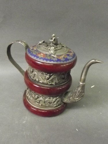 A Chinese white metal and cloisonné tiered tea pot with: A Chinese white metal and cloisonné tiered tea pot with raised dragon, monkey and frog decoration to side and top, impressed character mark to base, 5'' x 3''