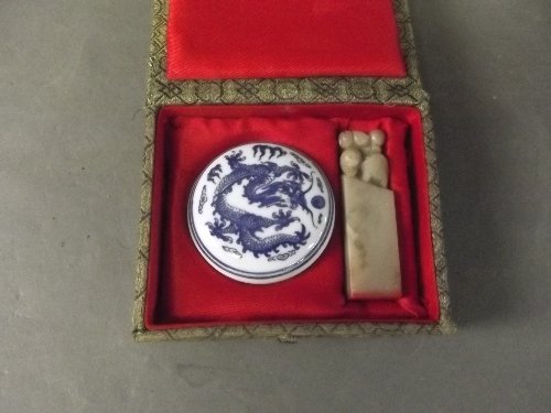 A Chinese blue and white pottery ink pot and a carved: A Chinese blue and white pottery ink pot and a carved stone seal, boxed, seal 2¾'' high