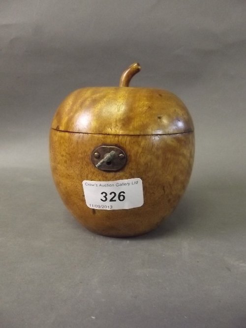 A Georgian style treen tea caddy in the form of an: A Georgian style treen tea caddy in the form of an apple, 4¾'' high
