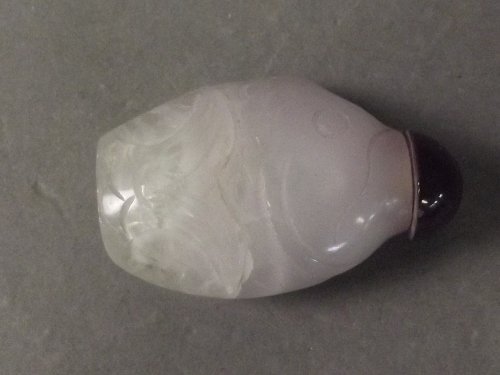 A Chinese glass snuff bottle moulded in the form of a: A Chinese glass snuff bottle moulded in the form of a fish, 2½'' long