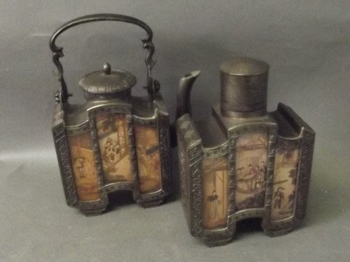 A Chinese early C20th pewter and reverse glass painted: A Chinese early C20th pewter and reverse glass painted teapot, and matching tea caddy, teapot seal mark to base, 8'' high