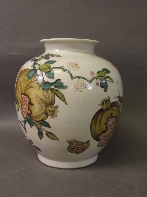 A Chinese vase with painted enamel decoration of: A Chinese vase with painted enamel decoration of pomegranates and bats, stamped mark to base, 7½'' high