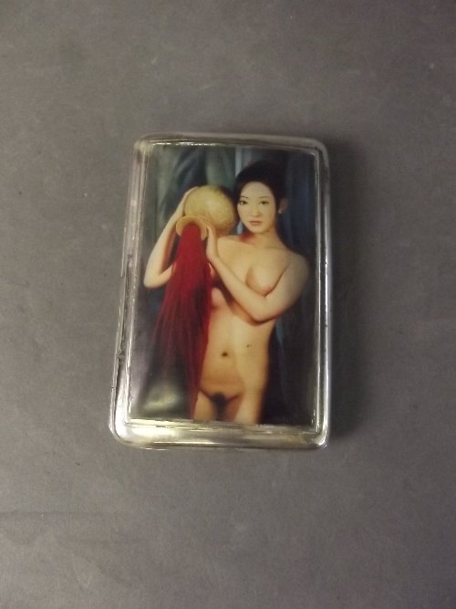 A silver and pictorial cigarette case decorated with a: A silver and pictorial cigarette case decorated with a nude (AF), 3½'' x 2¼''