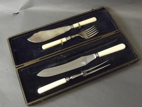 A boxed carving and fish serving set with bone handles,: A boxed carving and fish serving set with bone handles, 16'' long