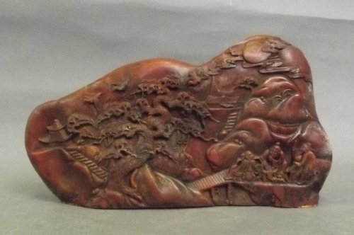 A Chinese carved hardstone depicting three Wise Men in: A Chinese carved hardstone depicting three Wise Men in a mountainous village scene, 9½'' long