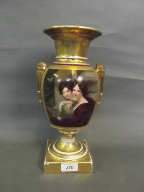 A C19th continental porcelain twin handled vase painted: A C19th continental porcelain twin handled vase painted with 2 maidens (AF), 12½'' high