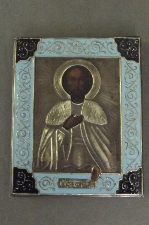 A continental silver and enamel icon with cloth back,: A continental silver and enamel icon with cloth back, 2¾'' x 3¼''