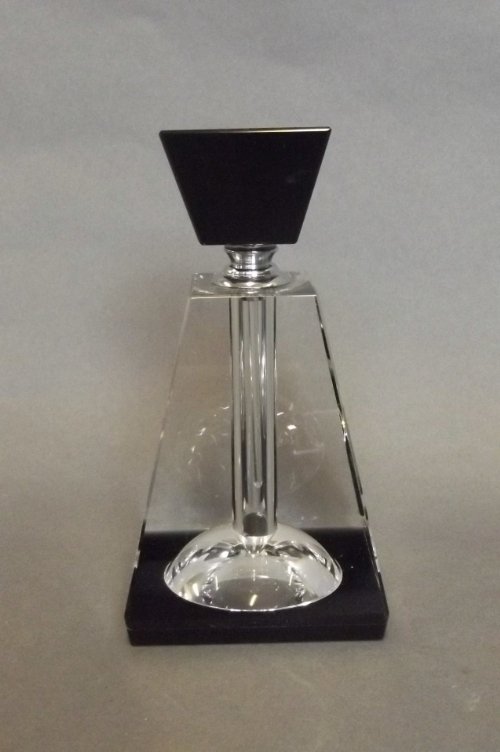 An Art Deco style pyramid shaped scent bottle with blac: An Art Deco style pyramid shaped scent bottle with black glass stopper, 5½'' high