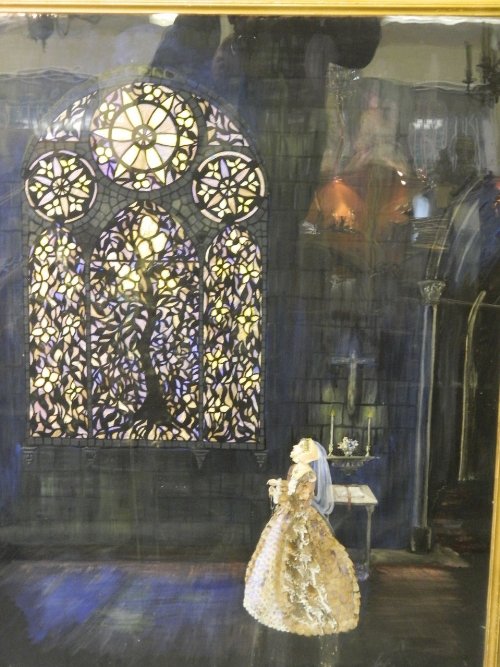 A watercolour, decoupage painting with applied butterfl: A watercolour, decoupage painting with applied butterfly wings, young woman by a church window, signed, 30'' x 39''