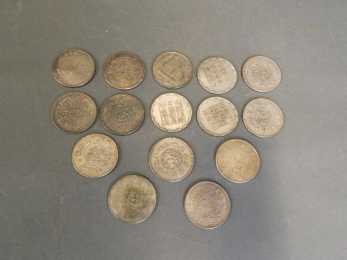 A collection of 15 Chinese coins: A collection of 15 Chinese coins