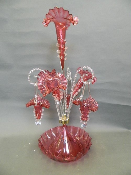 A large Cranberry glass Victorian style table Epergne,: A large Cranberry glass Victorian style table Epergne, 25Â½'' high
