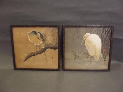 A pair of late C19th/early C20th Japanese wood block: A pair of late C19th/early C20th Japanese wood block prints in frames, one depicting a crane amongst reeds, the other of a wading bird, signed with a seal mark, 9Â¾'' x 9Â¼'', Best Bid