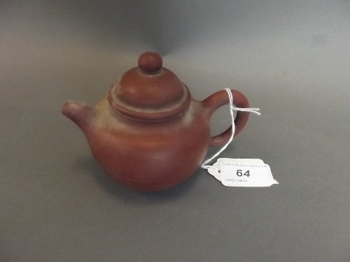 A small Chinese Yixing pottery teapot, seal mark to: A small Chinese Yixing pottery teapot, seal mark to base, 3½'' high