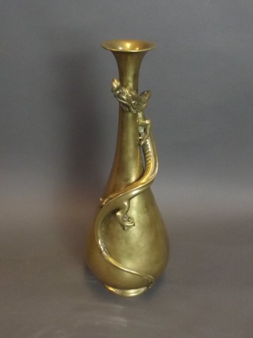 A Chinese bronze vase with climbing dragon decoration: A Chinese bronze vase with climbing dragon decoration to the neck, impressed 3 character mark to base, 11¼'' high