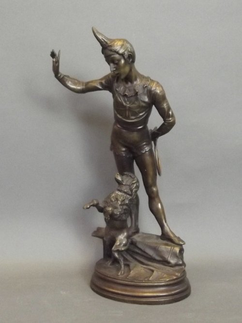A bronze figure of a clown and a performing poodle,: A bronze figure of a clown and a performing poodle, signed 'A. Barye. Fils. S', 14'' high