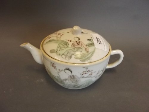 A C20th Chinese pottery teapot painted with figures,: A C20th Chinese pottery teapot painted with figures, 4'' high
