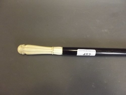 An ivory handled hardwood 'Dandy' cane, 37½'' high: An ivory handled hardwood 'Dandy' cane, 37½'' high (cane AF)