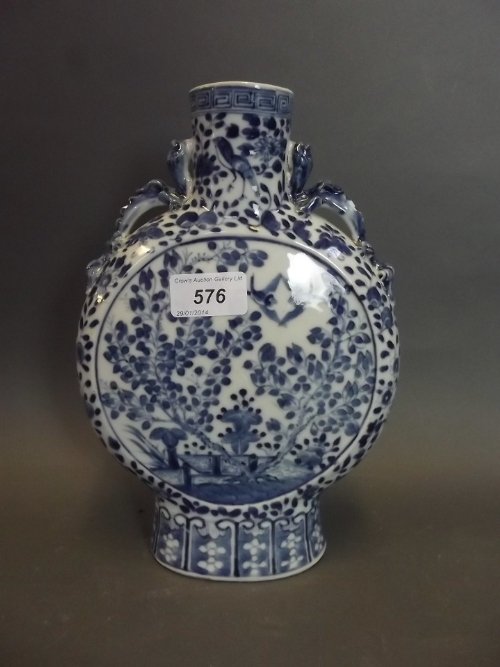 A good C19th Chinese blue and white twin handled: A good C19th Chinese blue and white twin handled moonflask painted with birds and flowers etc (AF), 10'' high