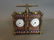A cloisonné and brass double carriage clock and