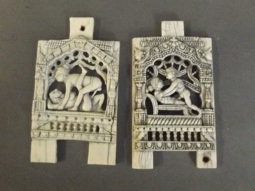 A pair of C18th Indian carved ivory erotic panels, 4'': A pair of C18th Indian carved ivory erotic panels, 4'' long