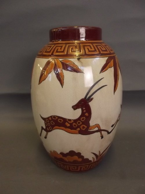 A large French pottery vase with leaping deer: A large French pottery vase with leaping deer decoration, 12'' high