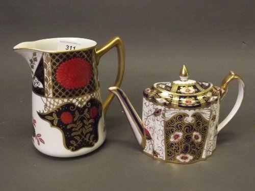 A Wedgwood Crown Derby patterned teapot, and a bone: A Wedgwood Crown Derby patterned teapot, and a bone china jug with lotus flower decoration, teapot 5'' high