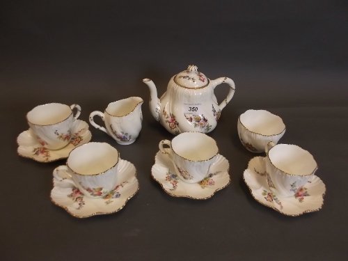 A Coalport tea service painted with summer flowers,: A Coalport tea service painted with summer flowers, 5¼'' high