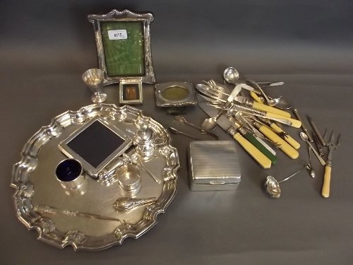 A quantity of Hallmarked silver photo frames, salts,: A quantity of Hallmarked silver photo frames, salts, cigarette case, and a quantity of silver plated items