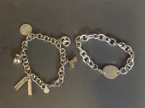 Two 925 marked silver chain link bracelets, one with: Two 925 marked silver chain link bracelets, one with New York inspired charms, 8'' long