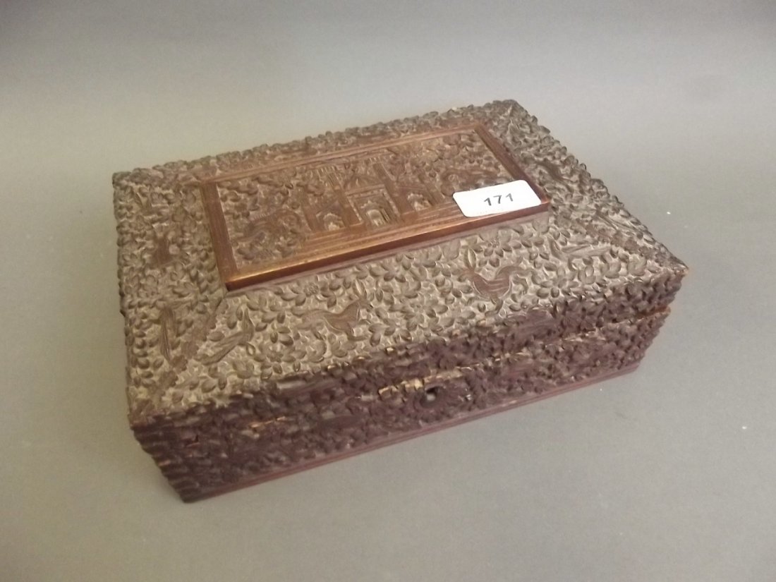 A C19th Oriental carved wood casket, 10'' x 7'', 3½'': A C19th Oriental carved wood casket, 10'' x 7'', 3½'' high