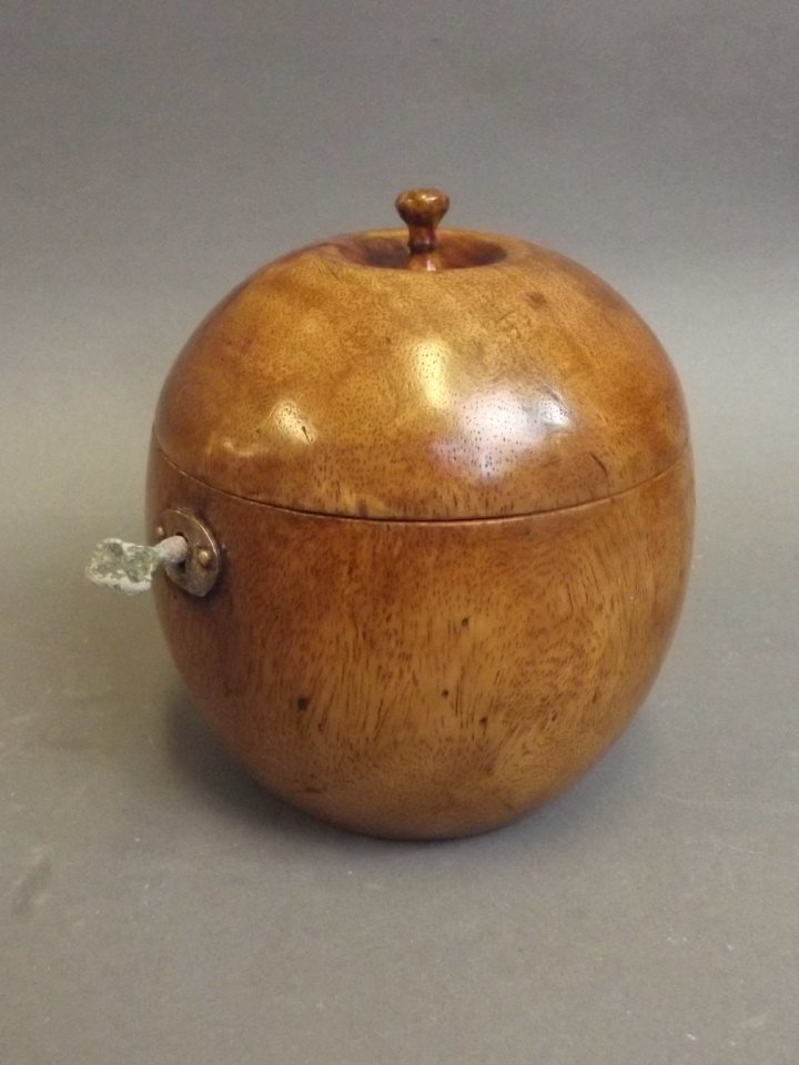 A tureen tea caddy carved in the form of an orange,: A tureen tea caddy carved in the form of an orange, 4¾'' high (AF)