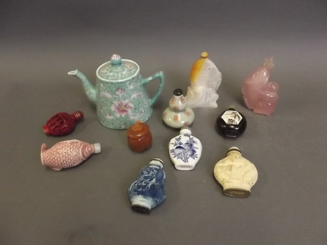 A collection of Chinese snuff bottles to include an: A collection of Chinese snuff bottles to include an enamel teapot etc