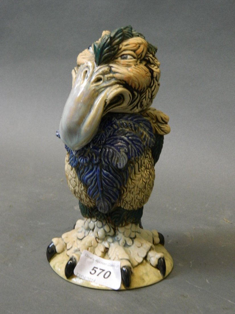 A Burslem ugly bird pottery jar and cover, signed