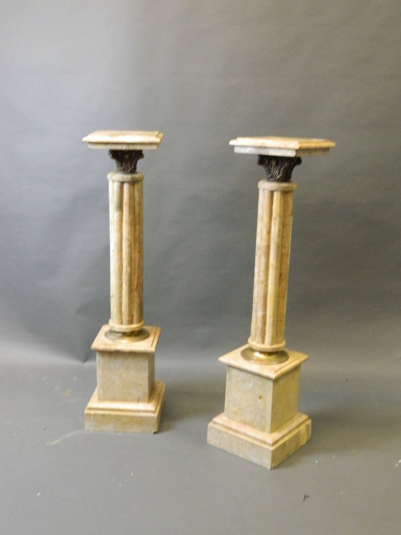 A pair of marble and brass architectural pedestals,: A pair of marble and brass architectural pedestals, 9½'' square, 40½'' high