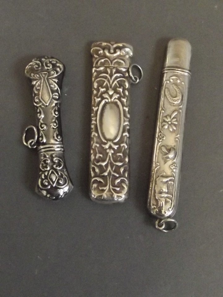 Three Continental silver needle cases: Three Continental silver needle cases