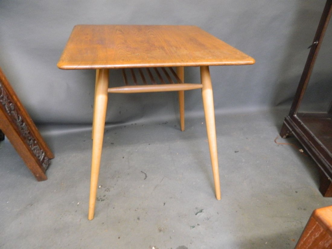 An Ercol light oak centre table, 27'' square, 28½'': An Ercol light oak centre table, 27'' square, 28½'' high