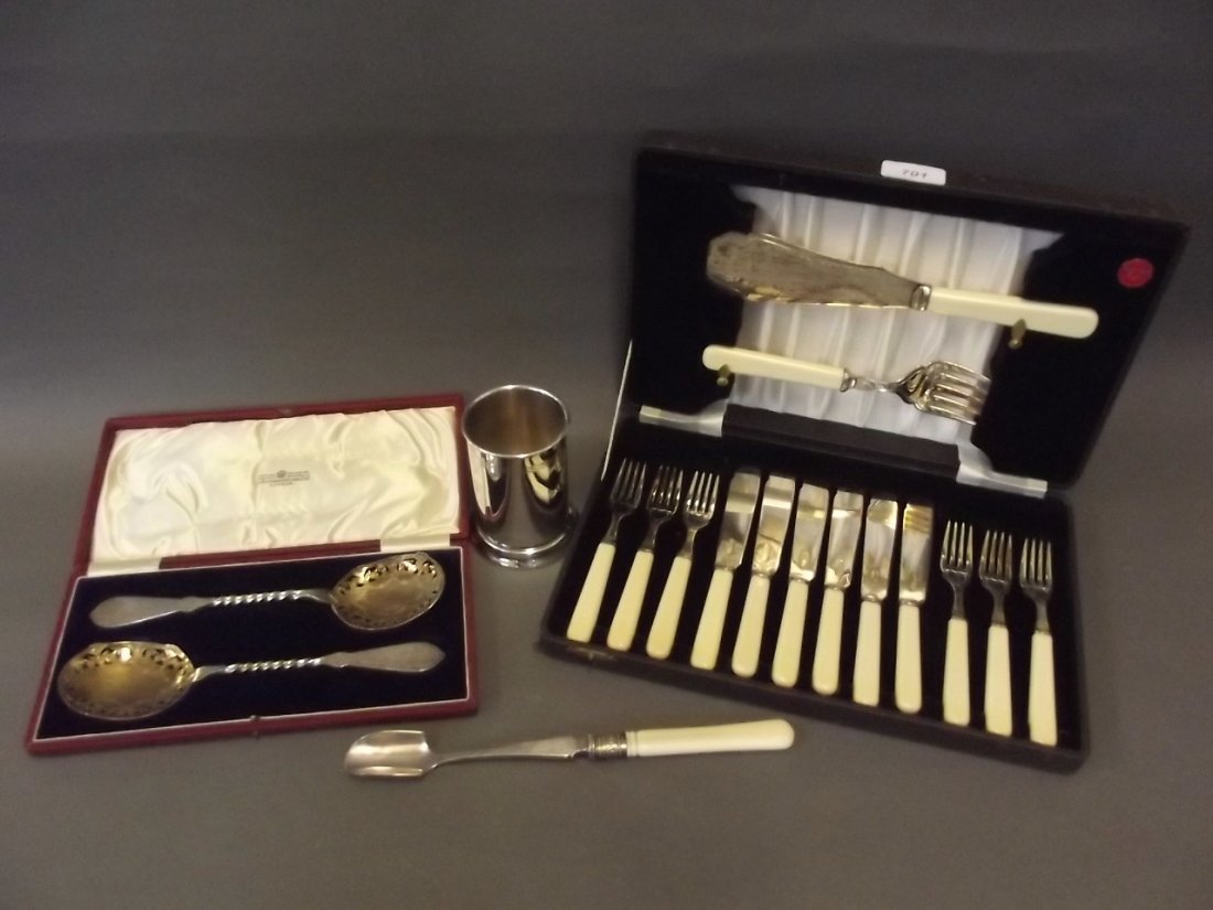 A pair of cased silver plated spoons, a silver plated: A pair of cased silver plated spoons, a silver plated marrow scoop, cased set of fish knives and forks etc
