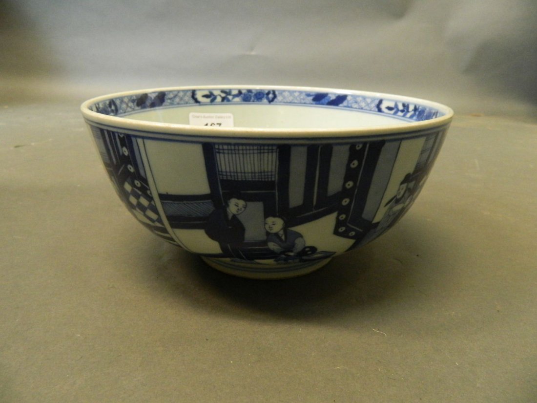 A Chinese porcelain bowl with blue and white decoration: A Chinese porcelain bowl with blue and white decoration of gentlemen in interior scenes, 6 character mark, 8'' diameter