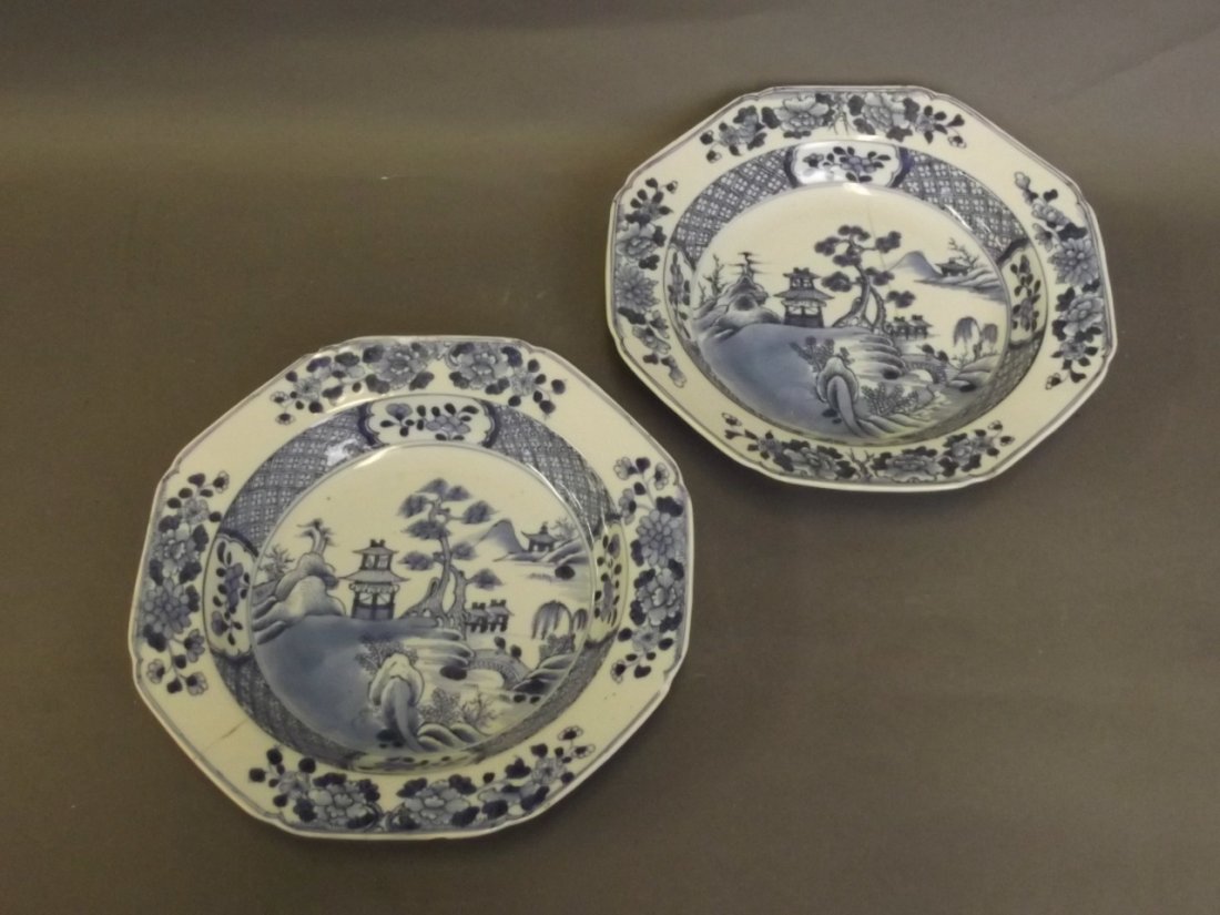 A pair of C18th Chinese blue and white shaped dishes,: A pair of C18th Chinese blue and white shaped dishes, 8¾'' diameter (AF)