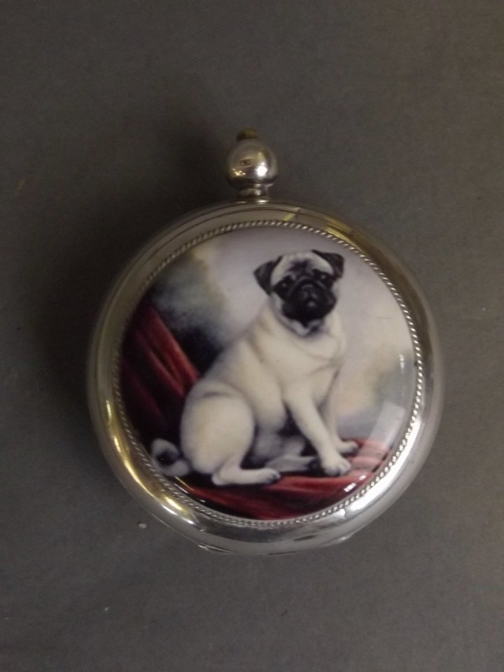 A Hallmarked silver pocket watch with a later applied: A Hallmarked silver pocket watch with a later applied cold enamel plaque depicting a pug, 2'' diameter