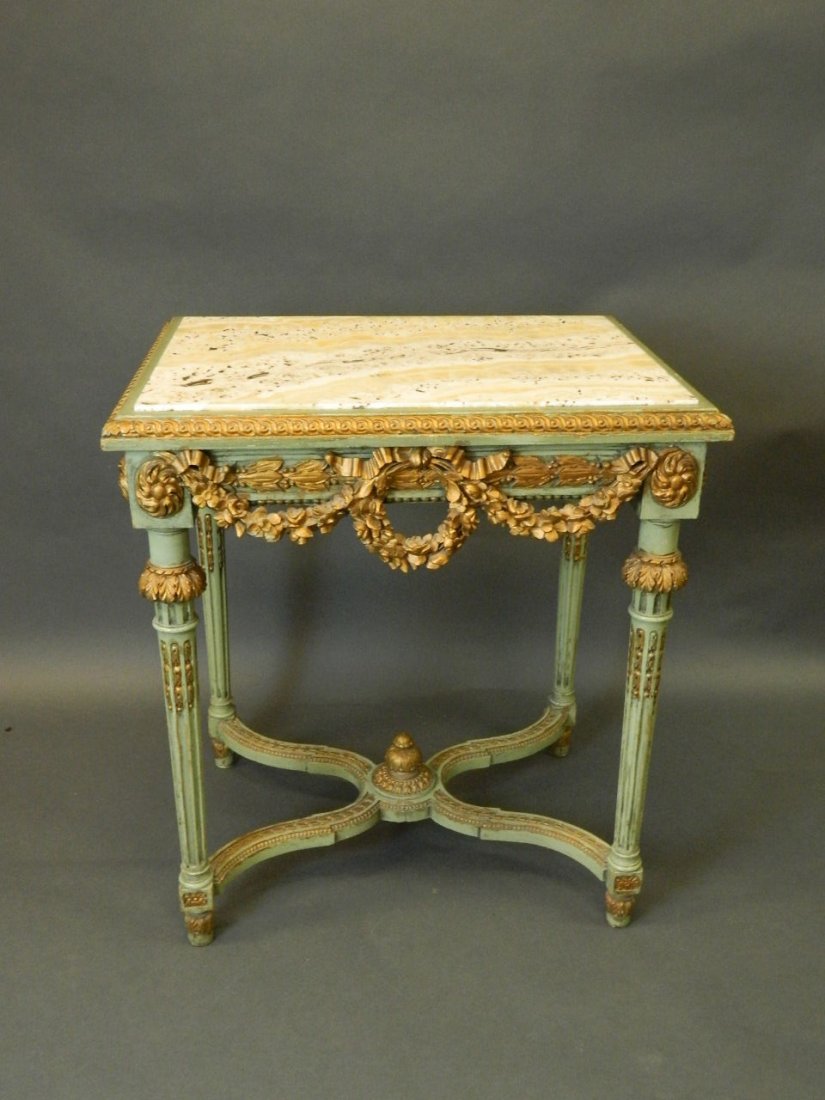 A good C19th French carved and painted topped centre: A good C19th French carved and painted topped centre table with shaped undertier and marble inset top, 26'' x 20'', 29'' high