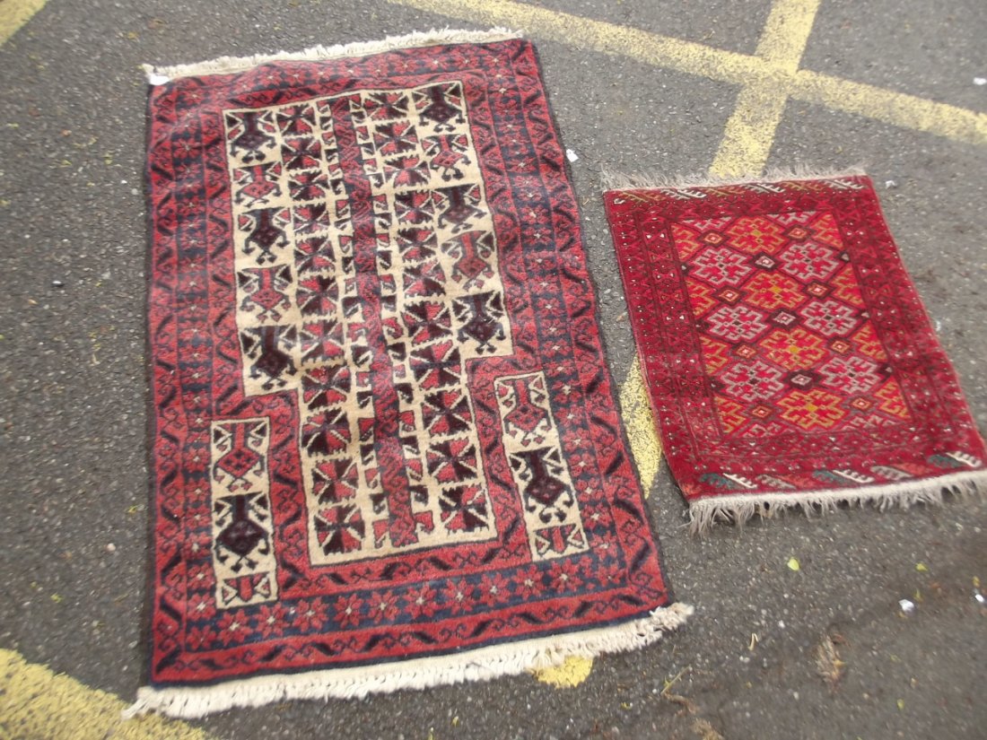 A Persian rug with geometric design, and another: A Persian rug with geometric design, and another smaller, 30'' square