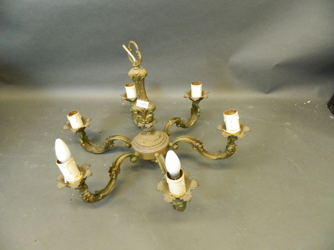 A cast brass six branch electrolier, 26½'' wide: A cast brass six branch electrolier, 26½'' wide