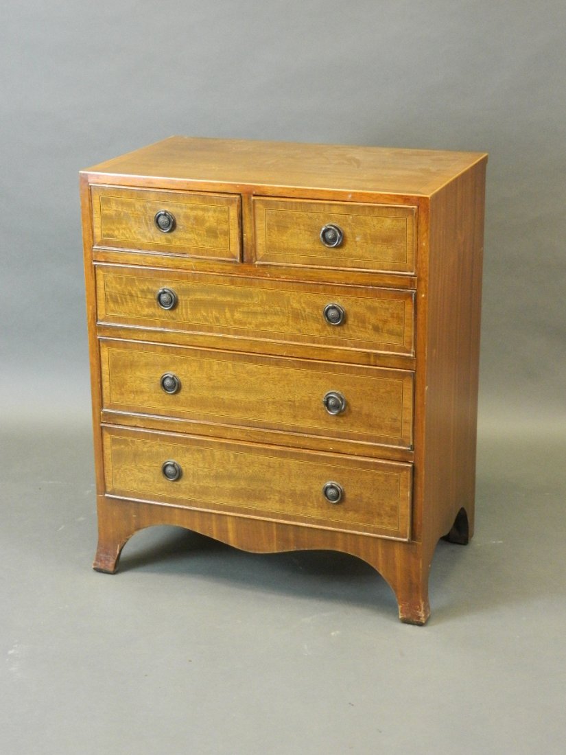 A small George III style inlaid mahogany chest of two: A small George III style inlaid mahogany chest of two short and three long drawers, 24'' x 15'', 29'' high