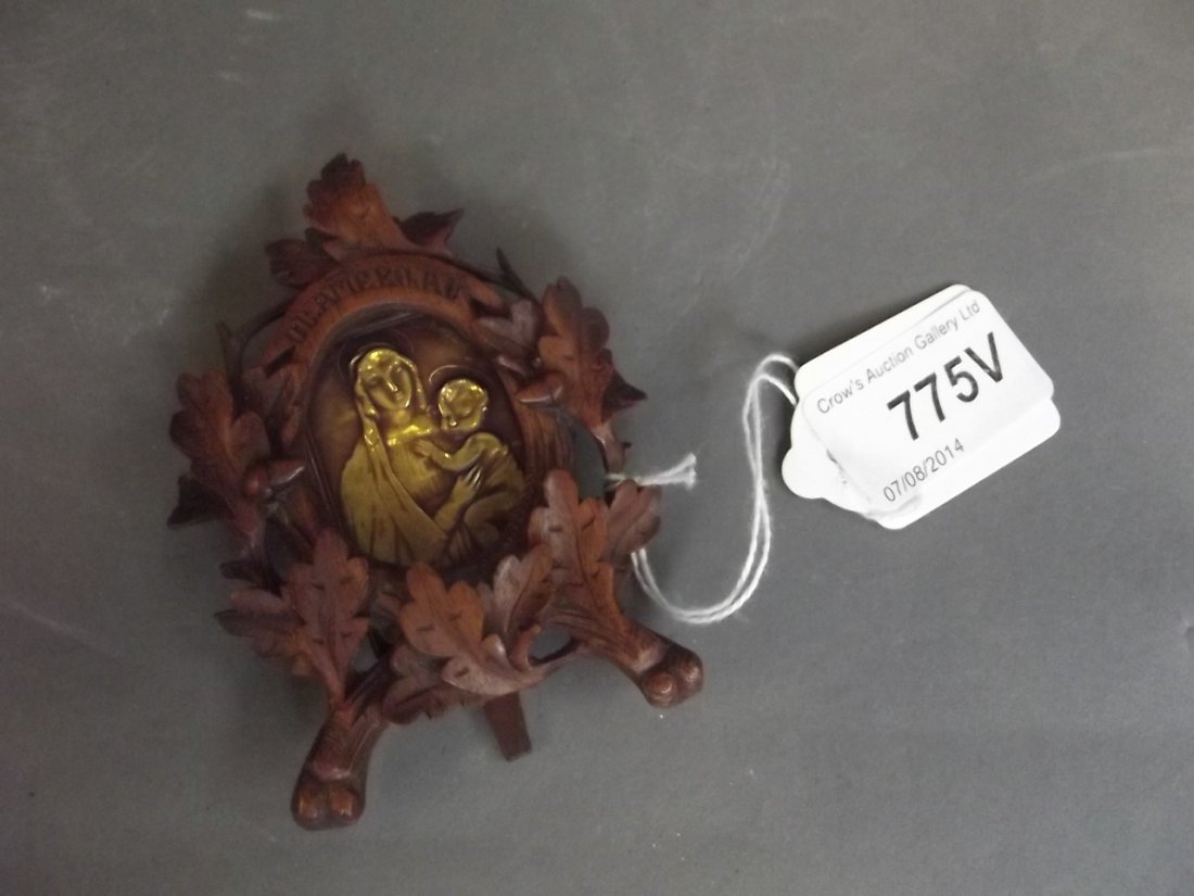 A Russian gold plaque in a carved walnut easel frame,: A Russian gold plaque in a carved walnut easel frame, tested, 3½'' x 2½''