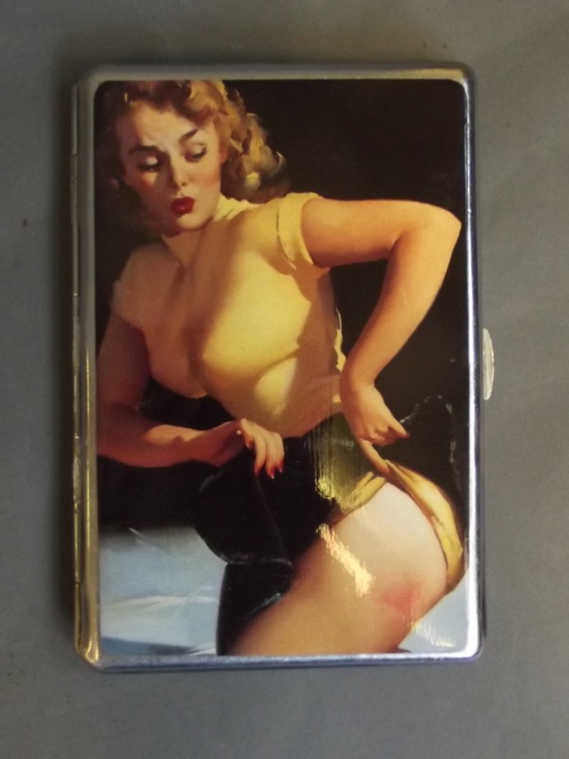 A silver plated cigarette case with later applied: A silver plated cigarette case with later applied pictorial image of a pin-up girl in a yellow blouse, 3½'' x 5''