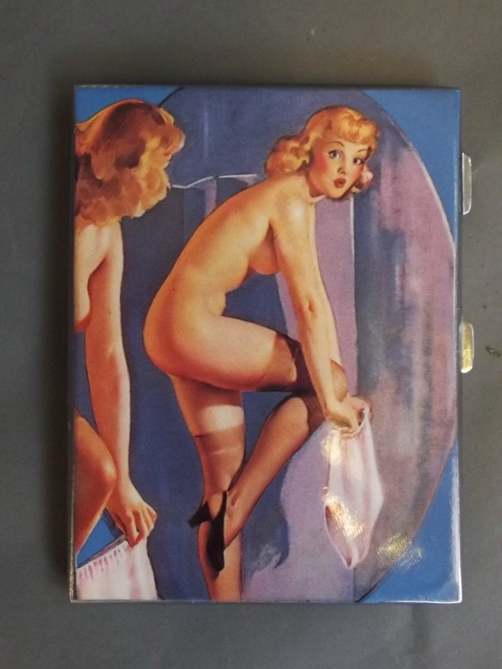 A silver plated cigarette case with later applied: A silver plated cigarette case with later applied pictorial image of a pin-up girl getting dressed, 3¼'' x 4½''